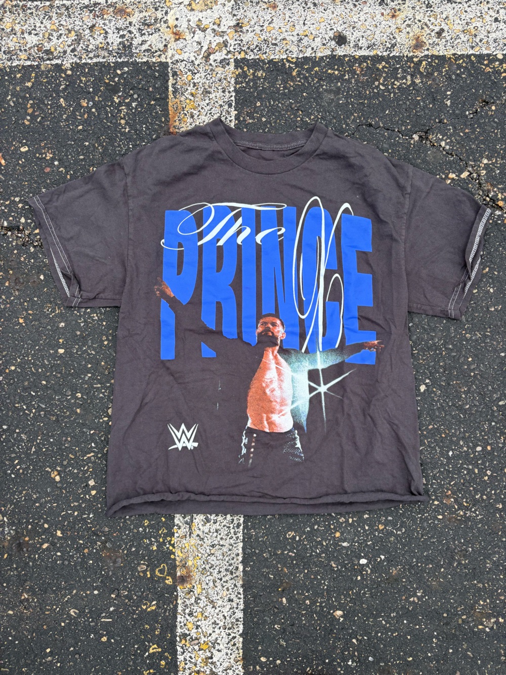 WWE Black Graphic 'Prince' Short Sleeve Tee with Blue Lettering